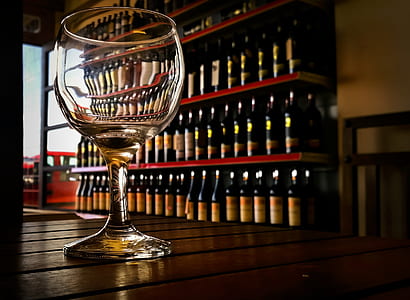 clear footed wine glass on table thumbnail