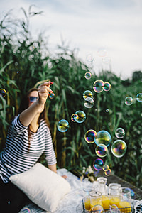 Having fun with soap bubbles in the nature thumbnail