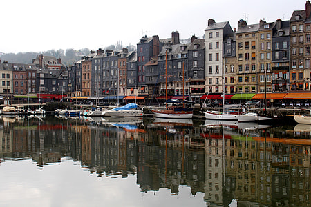 high-rise buildings near body of water during daytime thumbnail