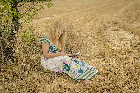 woman holding book thumbnail
