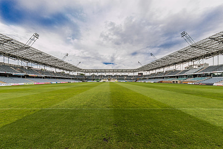 green and gray stadium during daytime thumbnail
