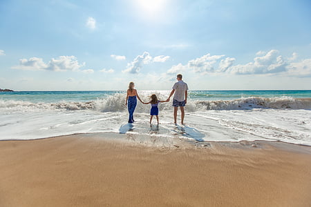 man and woman on seashore during daytime thumbnail