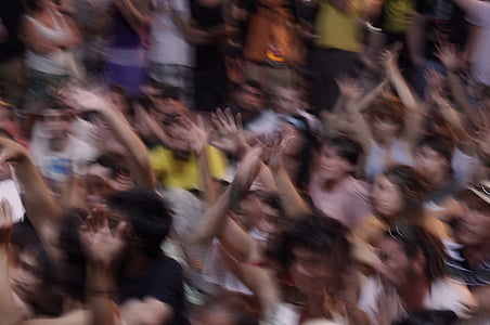 group of people rising there hands up thumbnail