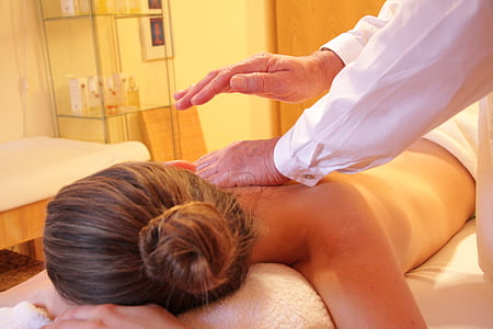 woman in prone position having a back massage thumbnail