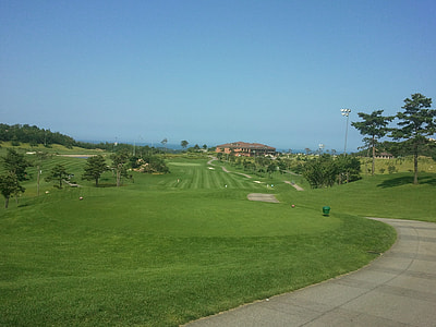 green grass golf course at daytime thumbnail