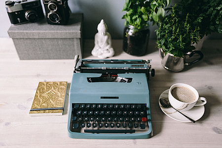 Working with old typewriter in the rainy day thumbnail