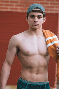 man wearing blue shorts thumbnail