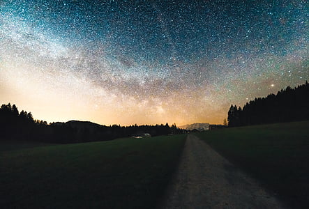 concrete road under starry sky thumbnail