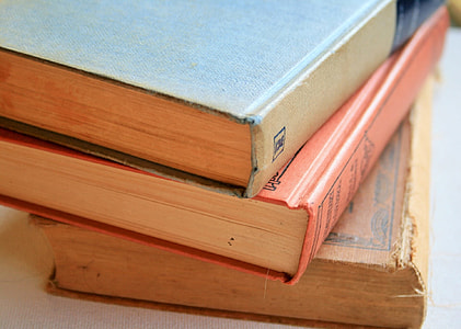 three pile of books thumbnail