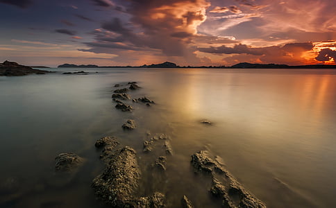 ocean under sunset thumbnail