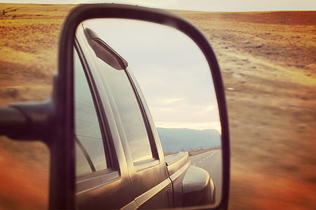 selective photography of black side mirror thumbnail