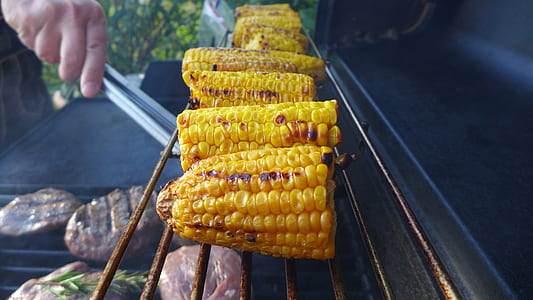 person grilling corn thumbnail