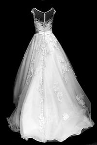 white sleeveless wedding dress with black background thumbnail