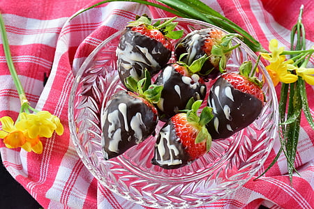 chocolate coated strawberries on clear cut glass bowl thumbnail