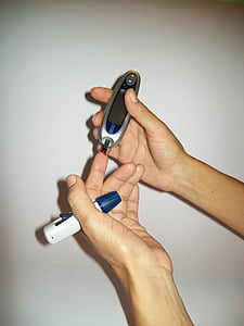 person using glucometer thumbnail