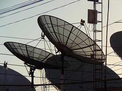 two parabolic antennas near tower thumbnail