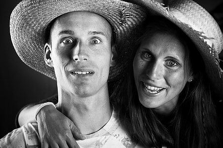 grayscale photo of man an woman wearing straw hat thumbnail