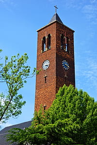 brown church under blue sky thumbnail