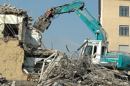 teal and white heavy duty equipment during daytime thumbnail
