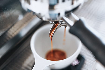 cup filled with brown condiment thumbnail