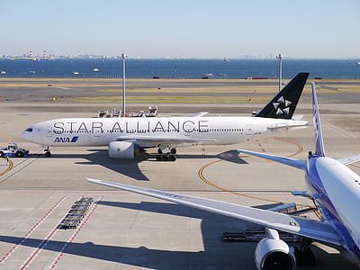 view of airplanes on airport during day time thumbnail