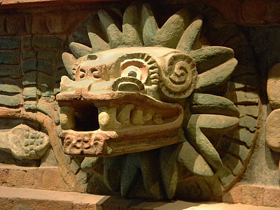 photo gray and brown dragon head statue thumbnail
