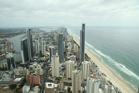 bird's-eye photography of city near beach thumbnail