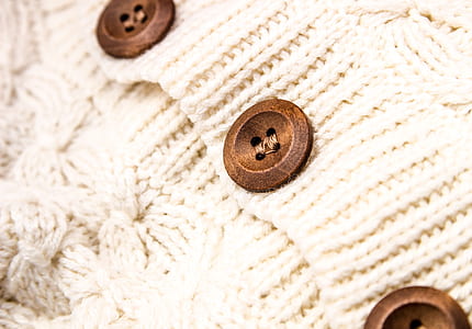 white knit apparel with brown buttons thumbnail