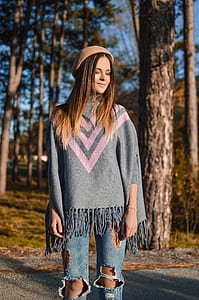 woman wearing gray and pink dress standing on forest thumbnail