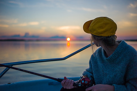 person fishing during sunset thumbnail