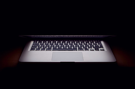MacBook on top of red surface thumbnail