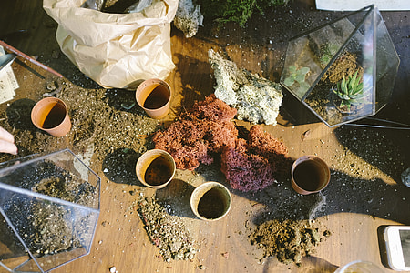five brown plant pots on floor thumbnail