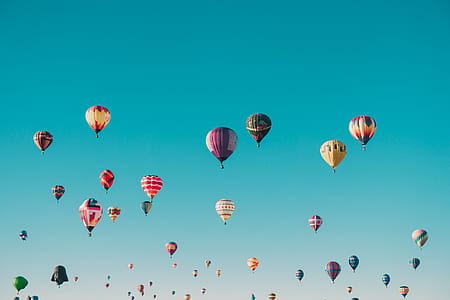 group of hot air balloons flying on sky thumbnail