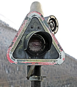 triangular shape black metal framed outdoor light turned off at daytime thumbnail