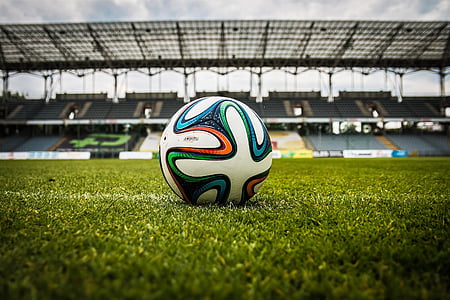 soccer ball on soccer field at daytime thumbnail