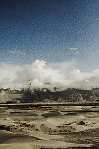 Mountain Covered With Clouds at Deserted Land thumbnail