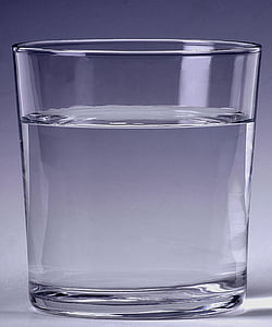 clear drinking glass filled with clear liquid thumbnail