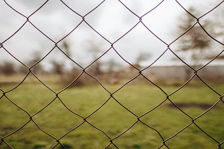 shallow focus photography of cyclone fence thumbnail