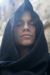 woman wearing black headdress thumbnail