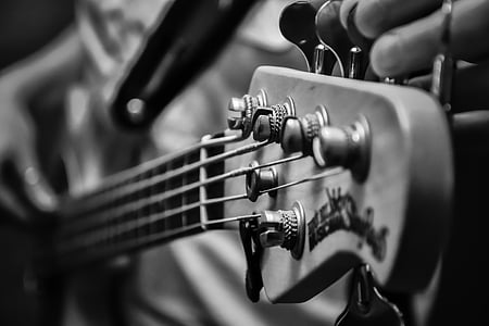 grayscale photography of guitar headstock thumbnail