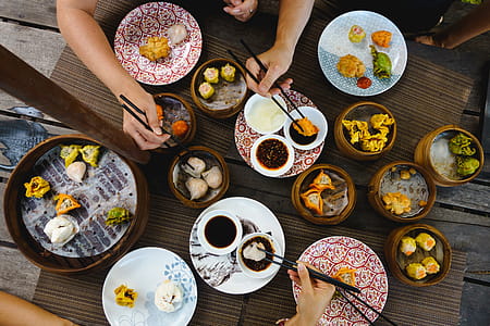 Vibrant shot of feasting on Chinese steamed and fried dim sum thumbnail