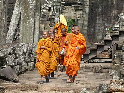 group of monks walking along the bricks thumbnail