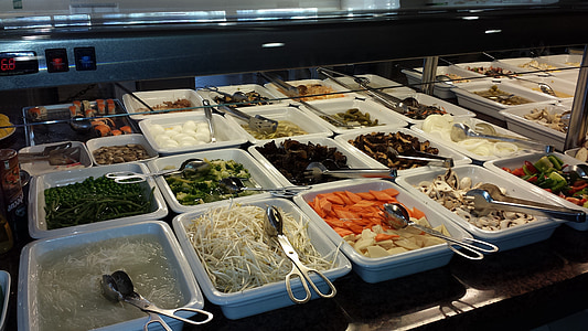 assorted dishes on food trays thumbnail