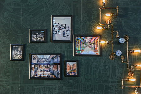 several assorted painting with black wooden frames thumbnail