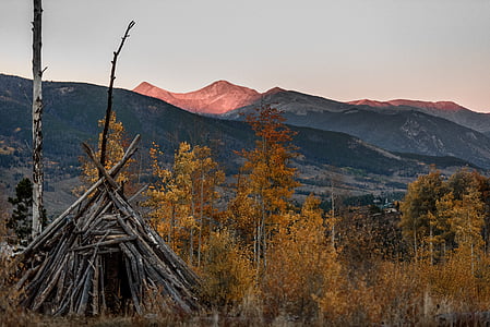 brown teepee tent during dawn thumbnail