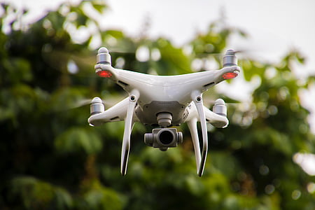 selective focus photography of white DJI Phantom on air thumbnail