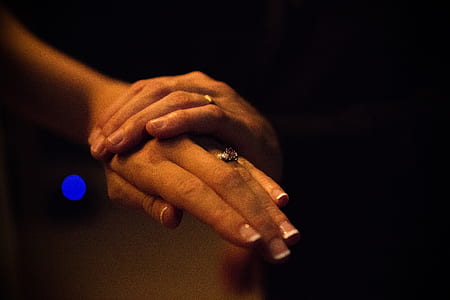 two person with engagement rings holding hands thumbnail