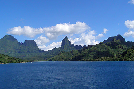 mountains near body of water thumbnail