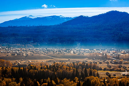 village with mountain in vicinity thumbnail