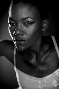 greyscale photo of woman wearing spaghetti strap top thumbnail